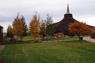 Trees changing color during fall outside of Strickland Chapel.