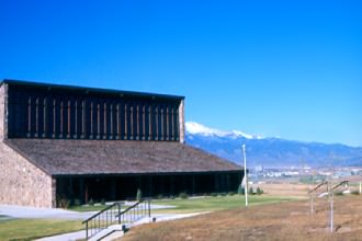 The Administration and Library Building (Sanders Building) with the undeveloped Apostles Court in the foreground.