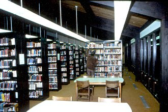 Early shot from inside Trimble Library. Notice the dark colored shelving.