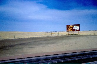 The sign reads, Future Site of ... Nazarene Bible College - Holy Bible: My Words Shall Not Pass Away