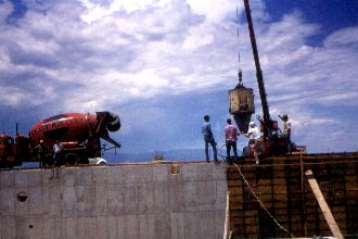 Here they are pouring the basement walls in the administration building.
