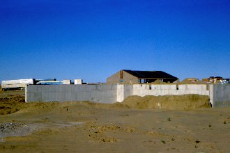 This is the administration building's corner retaining wall with Leist in the background.